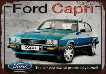 Металлическая табличка Ford Capri на стене.